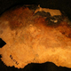 Skull fragment showing burn marks. (Image: Historic England)